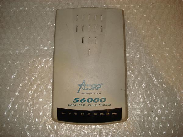 Продам Модем ACORP 56000